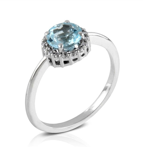 Anillo en oro blanco 18 quilates topacio azul y brillantes